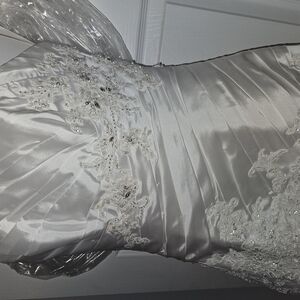 Elegant White Satin Gown with Lace Details
